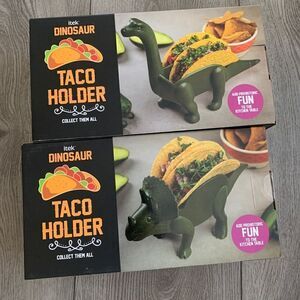 Itek se of two dinosaur taco holder. Bring the fun of jurassic to your tacos